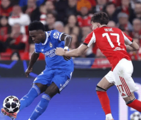 维尼修斯世界波绝杀!皇马残阵复仇本菲卡,穆帅染红埋雷